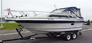 1987 Thundercraft Magnum Express 250 with trailer for sale in the Trenton area east of Toronto, Ontario, Canada by Ontario boat and yacht brokers.